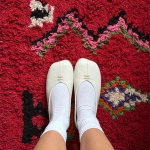 Claire added a photo of their purchase