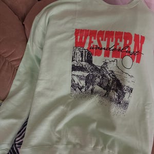 Teri added a photo of their purchase