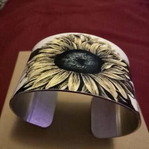 Cristina added a photo of their purchase