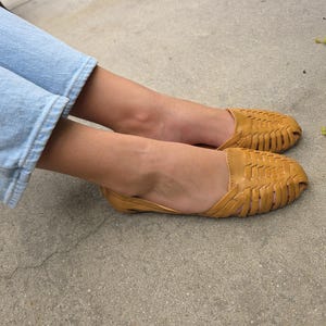 Leslie added a photo of their purchase