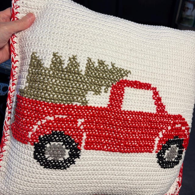 A customer's finished Farmhouse Truck Pillow Cover Crochet Pattern