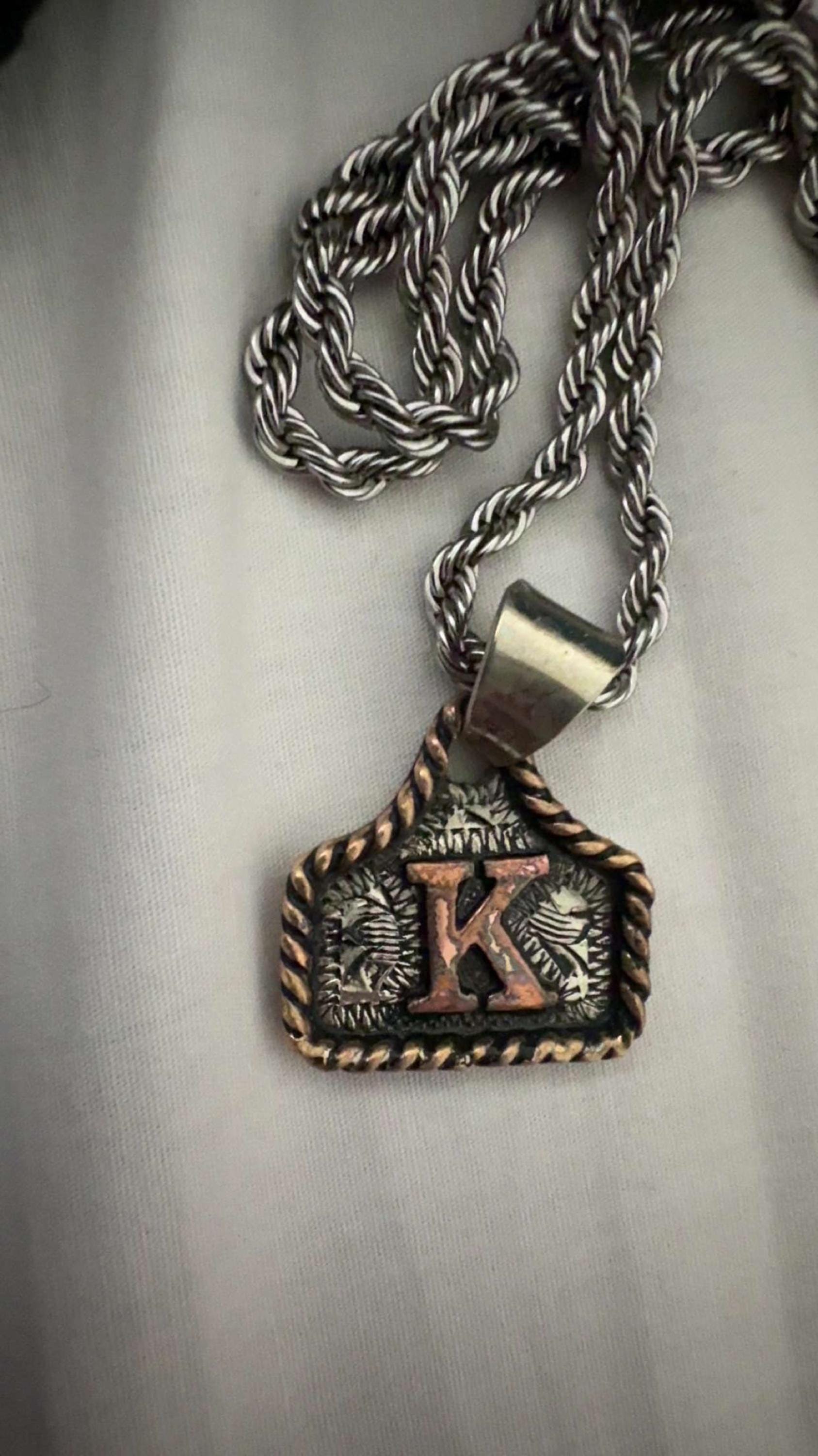 Cow Tag Necklace Handmade Personalized Initial Necklace, Handcrafted. Small Model.  Comes with a 23" Stainless Steel Chain.