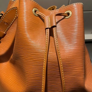 Lv drawstring shop bucket bag