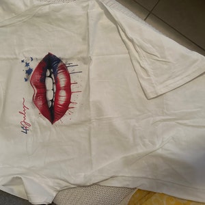 Oxana added a photo of their purchase