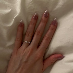 Alexander added a photo of their purchase