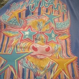 Ashley added a photo of their purchase