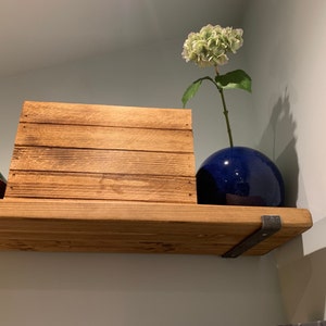 Naomi added a photo of their purchase