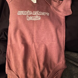 Ashley added a photo of their purchase