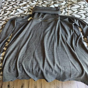 Courtney added a photo of their purchase