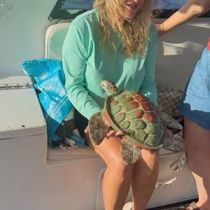 Pamela added a photo of their purchase