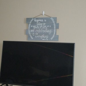 Sarah added a photo of their purchase