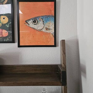 Angelina added a photo of their purchase