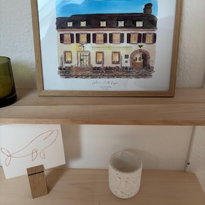 Lea added a photo of their purchase