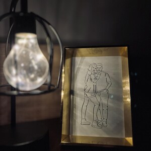 Gina added a photo of their purchase