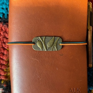 Amanda added a photo of their purchase