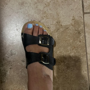 Mayra added a photo of their purchase