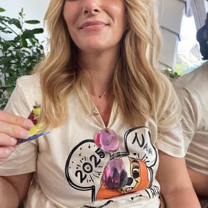 Nikki added a photo of their purchase