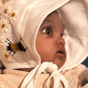 Birinit Petit Baby Knit bonnet with floral embroidery
