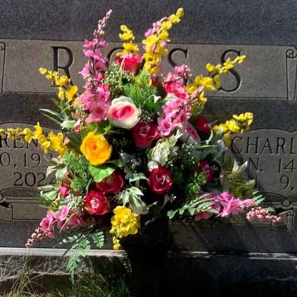 Pink and Yellow. Ranunculus, and Roses Grave Flower Arrangement ...