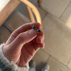 Customer photo from Florrie, Dainty Raw Emerald Stud Earrings in Yellow Gold