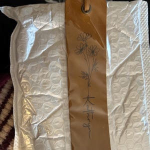 Mel added a photo of their purchase