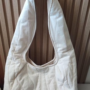 Lara added a photo of their purchase