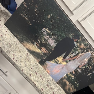 Cheryl added a photo of their purchase