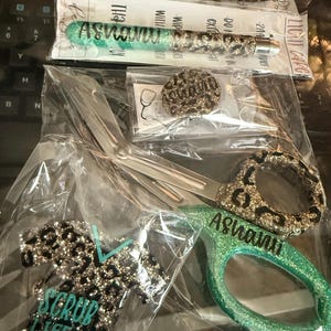 Ellison added a photo of their purchase