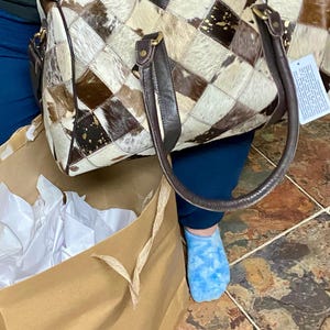 Tabatha added a photo of their purchase