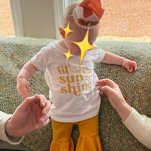 Sarah added a photo of their purchase