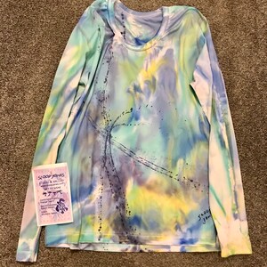 Natalie added a photo of their purchase