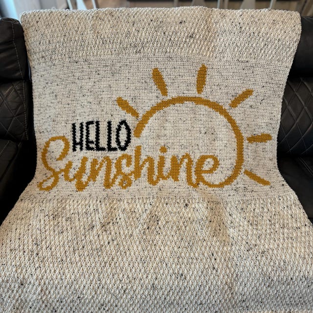 A customer's finished Hello Sunshine Blanket and Pillow Crochet Pattern