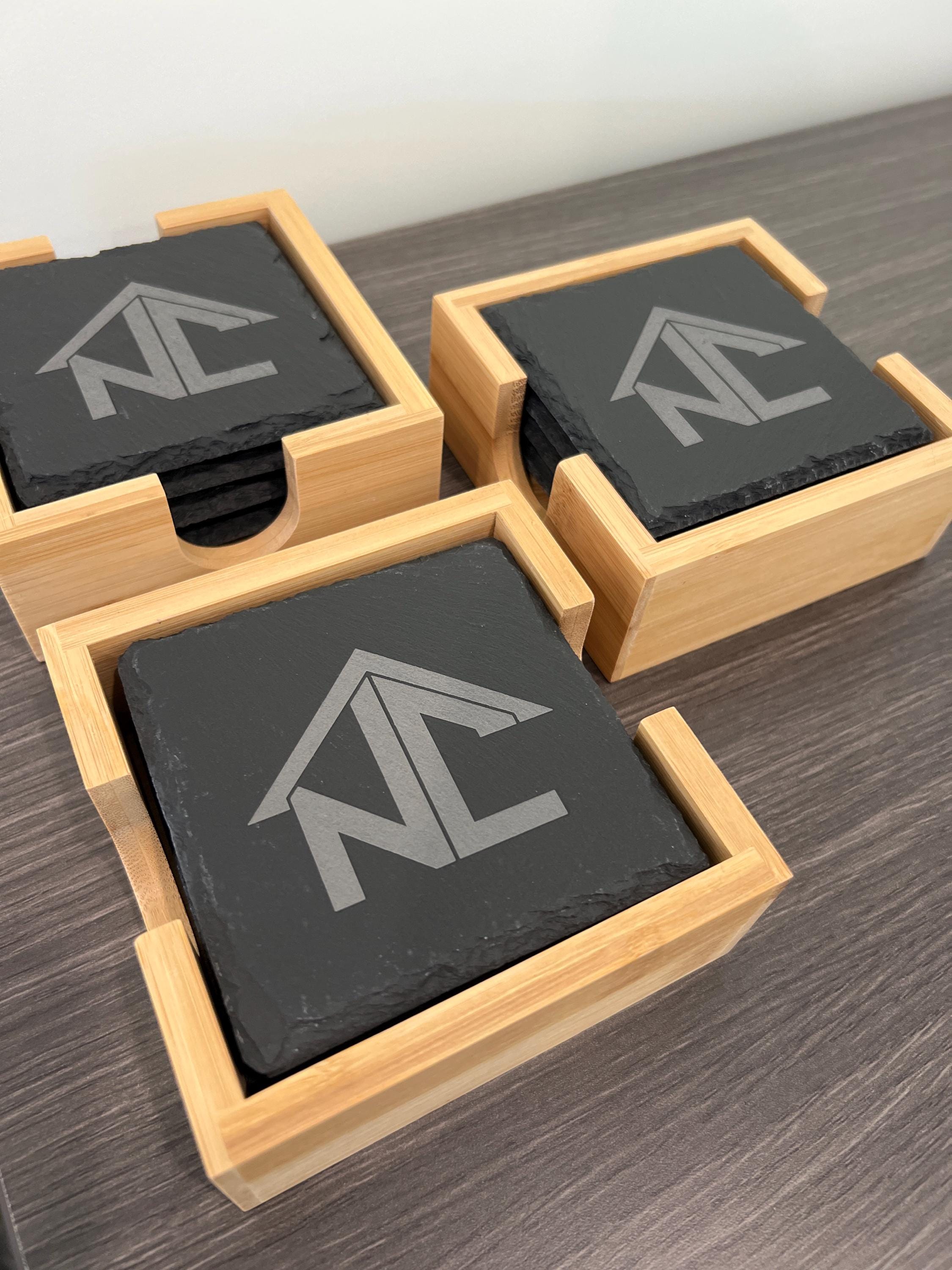 Customer photo of Set of 4 Custom Logo Engraved Slate Coasters with Bamboo Coaster Holder from Ariana