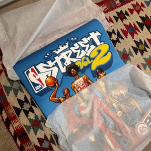 Aisha added a photo of their purchase