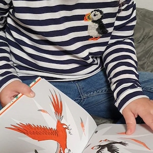 Alina added a photo of their purchase