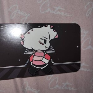 Aline added a photo of their purchase