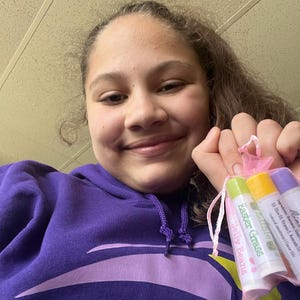 Sarah added a photo of their purchase