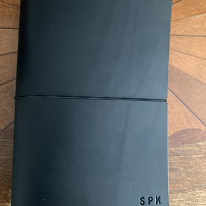 Sarah added a photo of their purchase