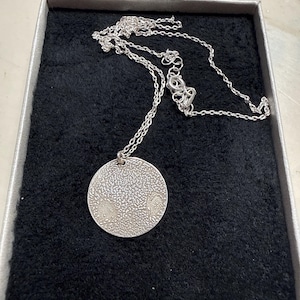 Angelique added a photo of their purchase