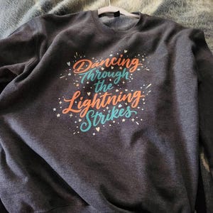 Tina added a photo of their purchase