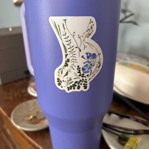 Sheila added a photo of their purchase