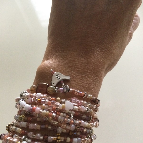 Buy the Turquoise Magnesite and Brown Wood Beaded Bracelet
