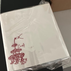 Caitlin added a photo of their purchase