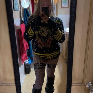 Taylor added a photo of their purchase