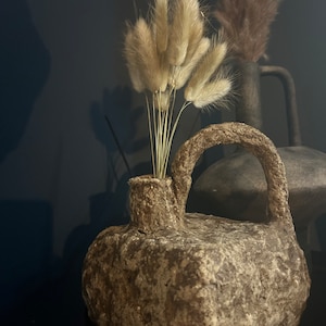 Sasha added a photo of their purchase