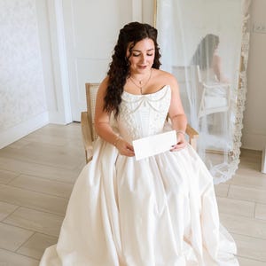 Catherine added a photo of their purchase