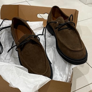 Arash added a photo of their purchase