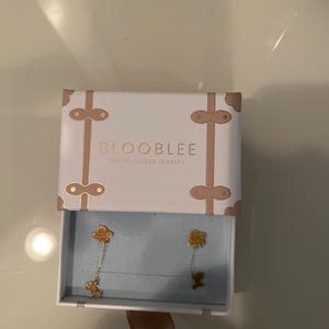 Customer photo, Cow Abduction Stud Earrings