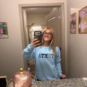 Kim added a photo of their purchase