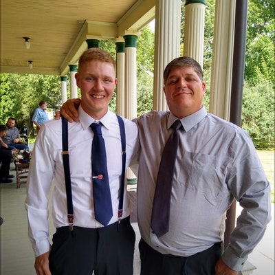 suspender with necktie